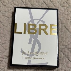 Yves Saint Laurent Gold and Black Accent